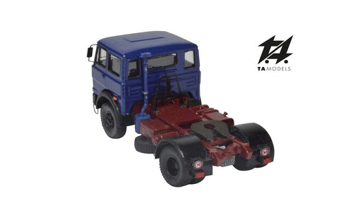 684 2-axle truck mounted on a blue tractor with a red chassis