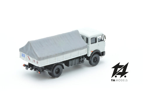 684 2-axle truck mounted in white with grey tarpaulin