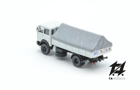 684 2-axle truck mounted in white with grey tarpaulin