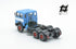 697 3-axle mounted light blue tractor truck with black chassis and white band
