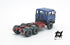 697 3-axle truck mounted on a blue tractor with a red chassis