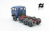 697 3-axle truck mounted on a blue tractor with a red chassis
