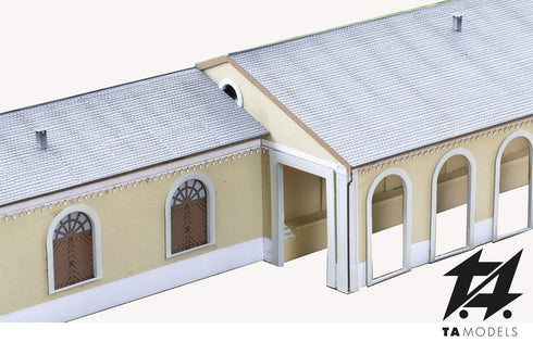 FS freight warehouse with covered loading platform, ochre yellow, H0 scale 1:87