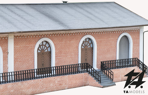 FS freight warehouse with loading platform covered with exposed bricks H0 1:87