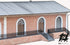 FS freight warehouse with loading platform covered with exposed bricks H0 1:87